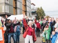 Happy crowd holds up apples for Food Day at Corvallis Farmers Ma