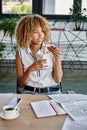 happy curly african american woman holding Royalty Free Stock Photo