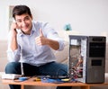 Happy customer resolving his computer problem Royalty Free Stock Photo