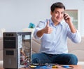 Happy customer resolving his computer problem Royalty Free Stock Photo