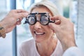 Happy customer in a vision test or eye exam for eyesight by doctor, optometrist or ophthalmologist with medical aid Royalty Free Stock Photo