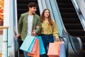 Happy Customers Couple Shopping Carrying Shopper Bags Walking In Mall Royalty Free Stock Photo