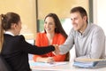 Happy customers handshaking after a deal Royalty Free Stock Photo