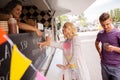 Happy customers queue at food truck Royalty Free Stock Photo