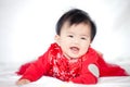 Happy cute asian baby girl in chinese tradition dress smiling Royalty Free Stock Photo