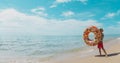 happy cute boy with floatie at tropical beach Royalty Free Stock Photo
