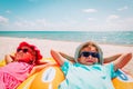 Happy cute boy and girl play on beach Royalty Free Stock Photo