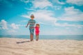 Happy cute boy and girl running on beach, kids play at sea Royalty Free Stock Photo