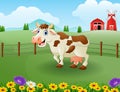 Happy cute brown cow in the farm with green field Royalty Free Stock Photo