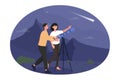 Happy cute couple are stargazing on a romantic night date Royalty Free Stock Photo