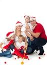 Happy cute family in santa's hats