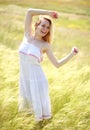 Happy cute girl enjoying a sunny summer day Royalty Free Stock Photo