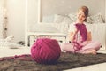 Happy cute girl knitting Royalty Free Stock Photo