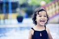 Happy cute girl at swimming pool Royalty Free Stock Photo