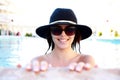 Happy cute girl in swimming pool Royalty Free Stock Photo