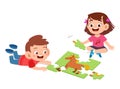 happy cute kids play solve puzzle together Royalty Free Stock Photo
