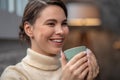 Happy cute lady enjoying her coffee break Royalty Free Stock Photo