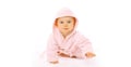 Happy cute little baby crawling in pink bathrobe on the floor on white background, banner blank copy space for advertising text Royalty Free Stock Photo