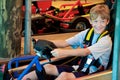 Happy cute little boy on go cart. Royalty Free Stock Photo