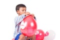 Happy cute little boy play red balloon Royalty Free Stock Photo