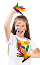 Happy cute little girl with colorful painted hands Royalty Free Stock Photo