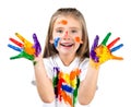 Happy cute little girl with colorful painted hands Royalty Free Stock Photo