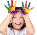 Happy cute little girl with colorful painted hands Royalty Free Stock Photo