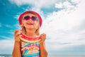 Happy cute little girl eating watermelon at beach Royalty Free Stock Photo