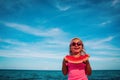 Happy cute little girl eating watermelon at beach Royalty Free Stock Photo