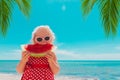 Happy cute little girl eating watermelon on beach Royalty Free Stock Photo