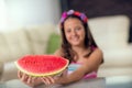 Happy cute little girl eating watermelon Royalty Free Stock Photo