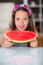 Happy cute little girl eating watermelon Royalty Free Stock Photo