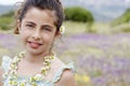 Happy Cute Little Girl In Flower Necklace Royalty Free Stock Photo
