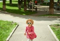 Happy cute little girl running in the park. Happiness. Royalty Free Stock Photo