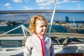 Happy cute little toddler girl on cruise ship. Adorable baby child making family vacations cruising through Europe and