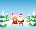 Happy and cute Santa Claus and Mrs Claus celebrate winter holidays - winter landscape Royalty Free Stock Photo