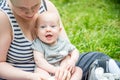 Happy cute toddler baby boy with his mom in park Royalty Free Stock Photo