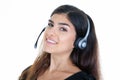 Happy cute woman in call center smiling cheerful support phone operator portrait in phone headset Royalty Free Stock Photo