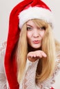 Happy cute woman in santa helper hat. Christmas. Royalty Free Stock Photo