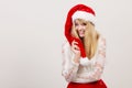Happy cute woman in santa helper hat. Christmas. Royalty Free Stock Photo