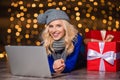 Happy cute woman using laptop computer Royalty Free Stock Photo