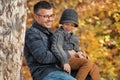 Father and son playing together outdoors in the park