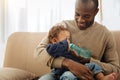 Happy daddy feeding his little son Royalty Free Stock Photo