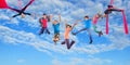 Happy dancing jumping children in sky Royalty Free Stock Photo