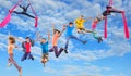 Happy dancing jumping children in sky Royalty Free Stock Photo