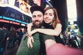 Happy dating couple in love taking selfie photo on Times Square in New York while travel in USA on honeymoon Royalty Free Stock Photo