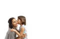 Happy daughter kissing her mother, isolated on white background Royalty Free Stock Photo