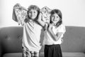 Happy daughter and son eating pizza. Children kids enjoy and having fun with lunch together at home. Funny children Royalty Free Stock Photo