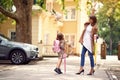 Happy day of back to school. Mother taking child to primary school Royalty Free Stock Photo