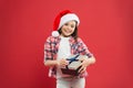 Happy day. Little girl hold gift box. Winter holidays. Merry christmas. Santa claus gift. Shopping for presents. Small Royalty Free Stock Photo